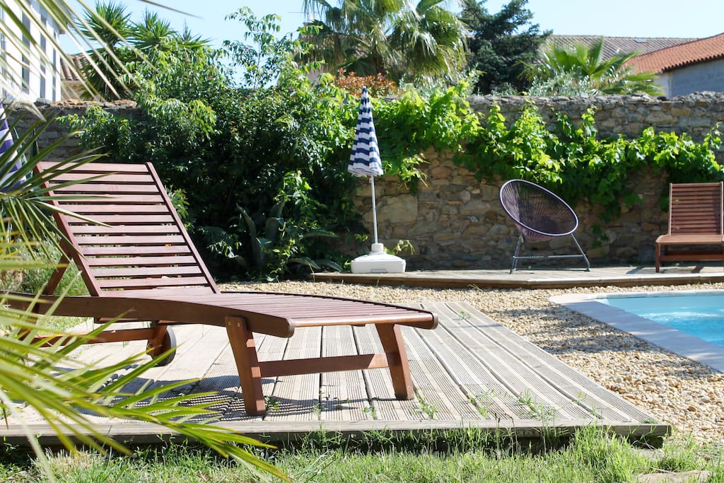 Lovely sunny pool with loungers