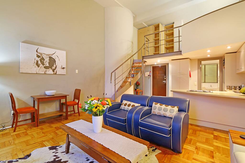 Heritage Loft has a Afro-centric mid-century modern vibe