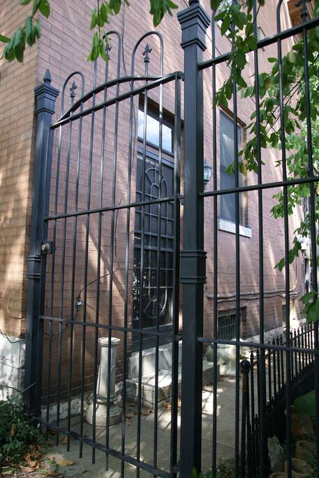 This is your private, gated entrance located to the right of the house.