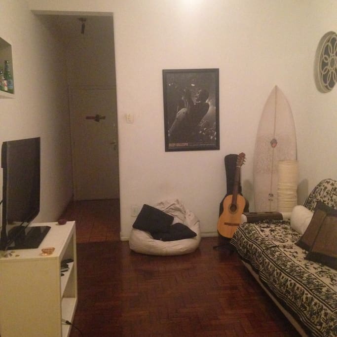 Guitar is for guests, but surf board won't be at the flat when you rent it.