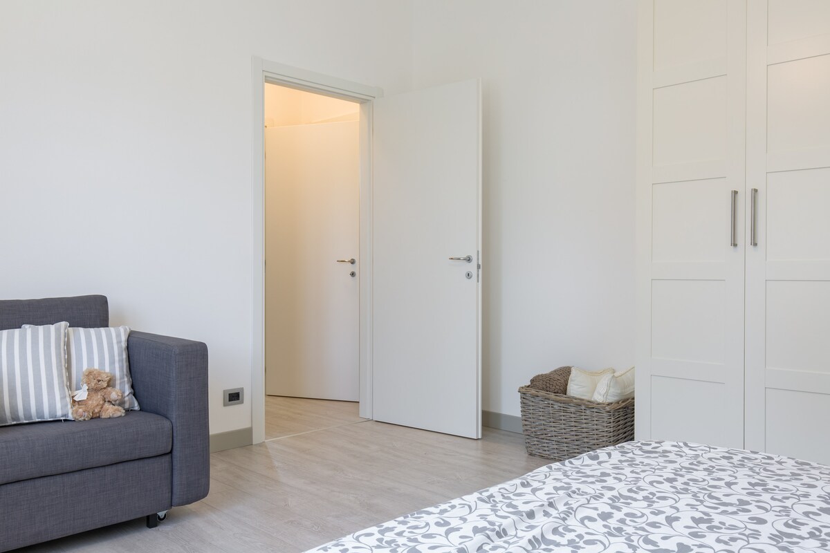 Dvojlôžková spálňa s pohovkou/posteľou