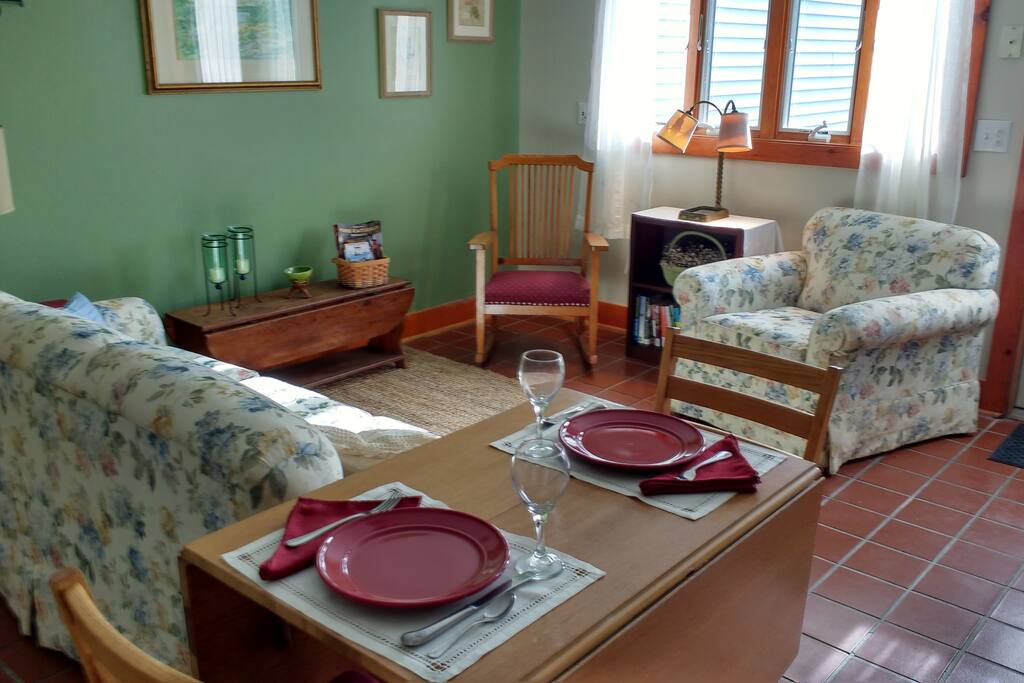 Living space with queen sofa bed.
