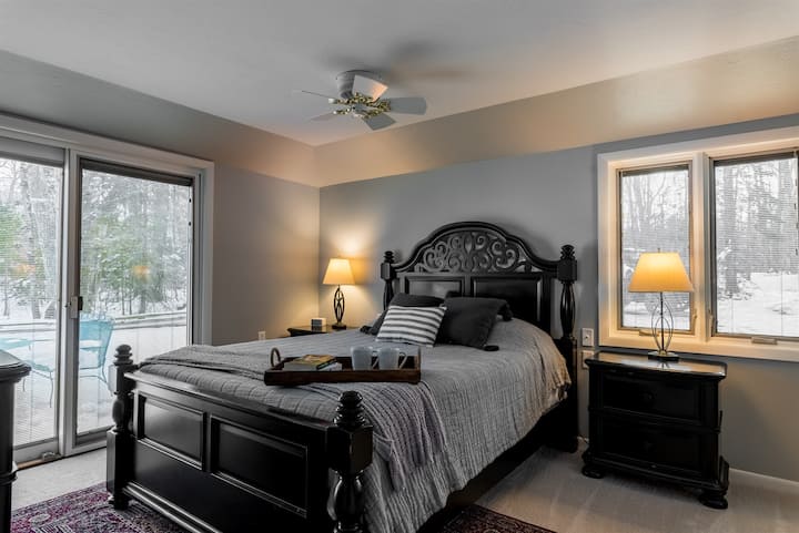 The guest room on the main floor offers a queen bed.