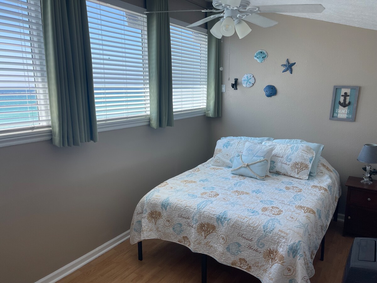 Personally, I always stay in the loft bedroom where you can see the great views and the moon over the water at night.  