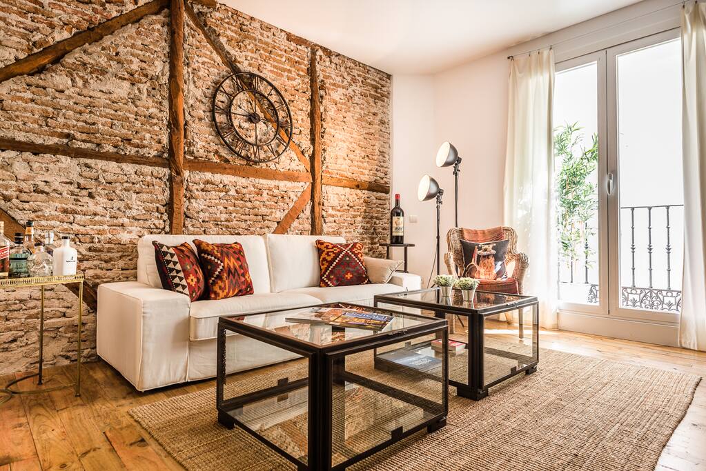 Living room space with small balcony.