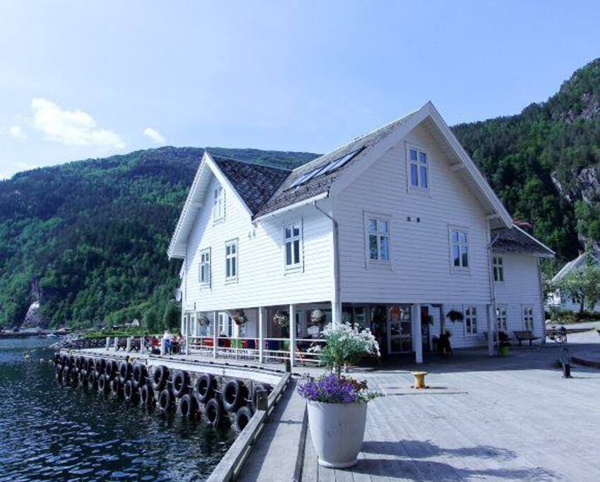 This old house from 1900 was a boat/storagehouse before now it holds the Restaurant on the main floor and the smallest apartments on the 2 floor.