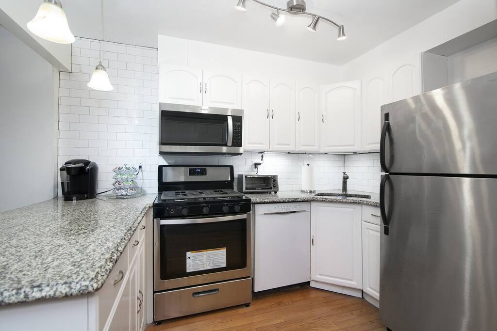 Modern, stainless steel Kitchen with complimentary coffee!