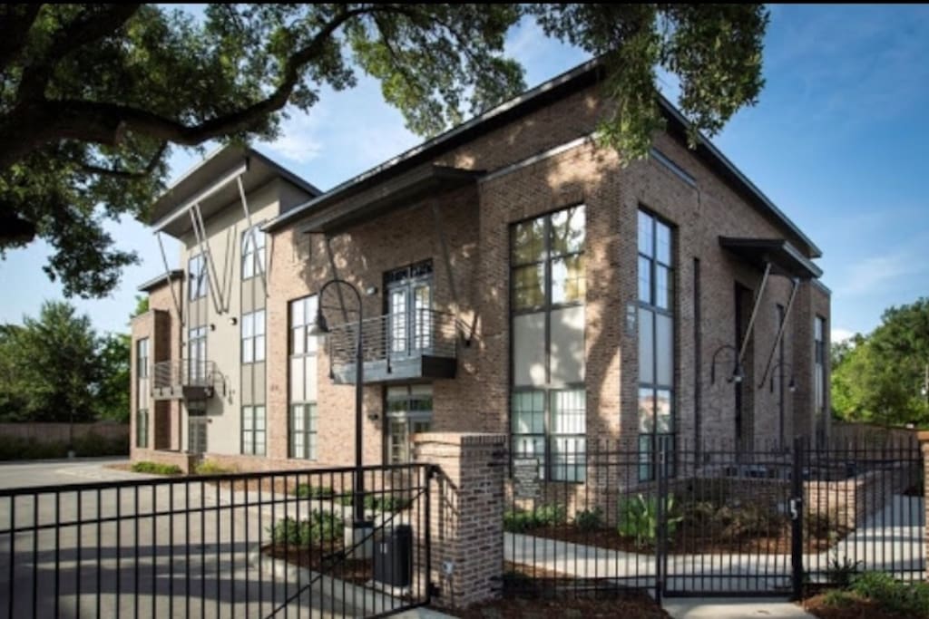 Entrance of Three Thirty Three. Apartment 8 is located on the second floor (far left with balcony).