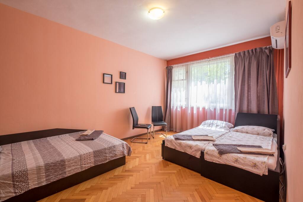 BEDROOM with A/C and king size bed as well as large - king single bed