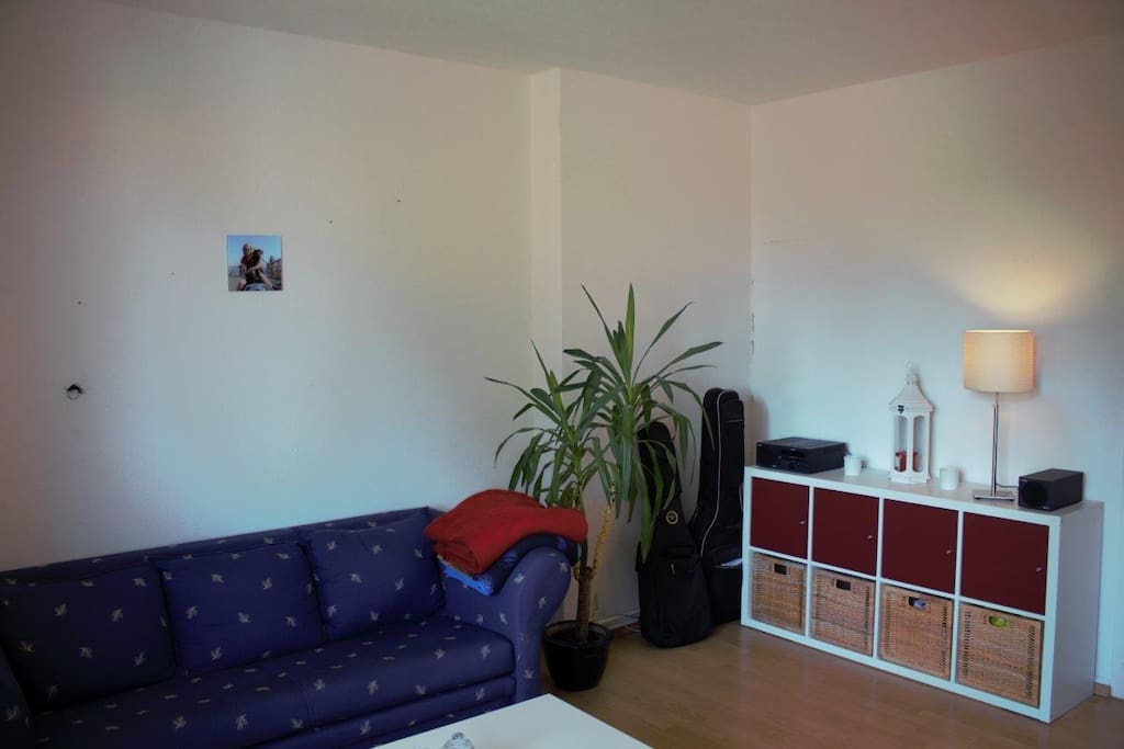 Wohnzimmer mit Schlafsofa
