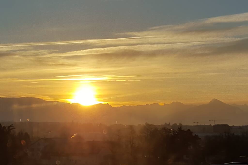 Vue sur les Alpes du balcon en fin de journée