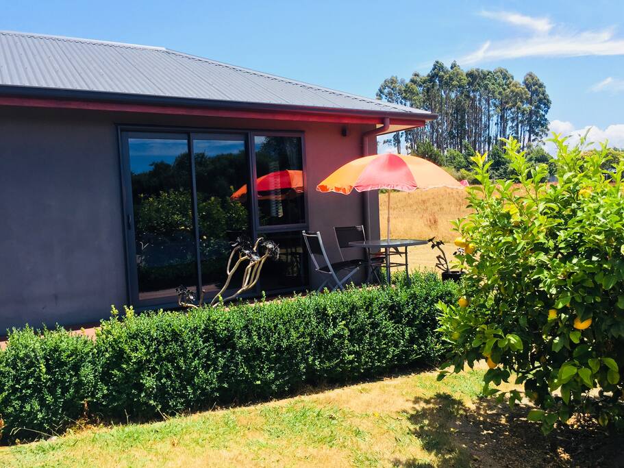 A private deck with an outdoor setting for two. Ideal for a summer breakfast in the sun.