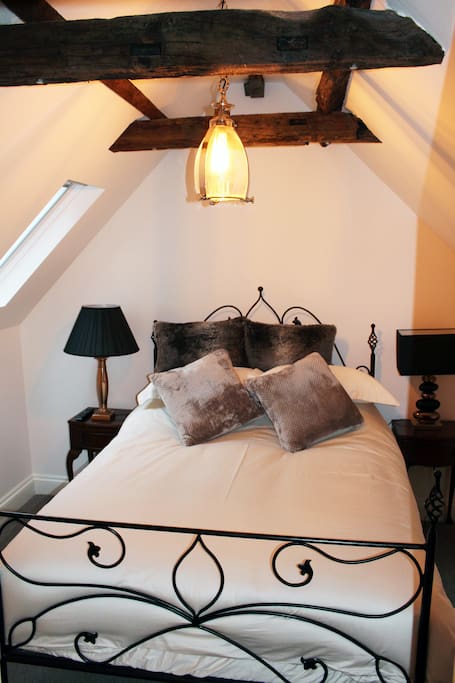 Double bedroom with vaulted ceilings