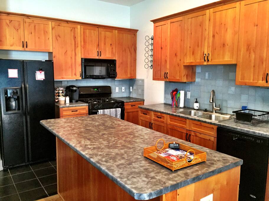 Full kitchen! Pots/pans, bakeware, amenities, Keurig w/complimentary k-cups (not pictured) for your use!