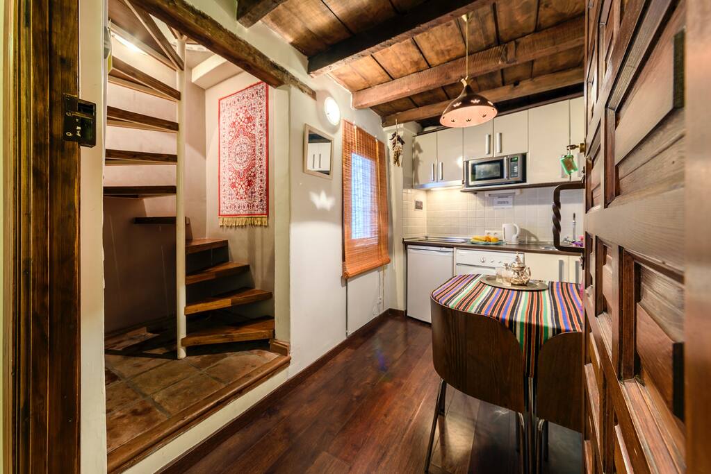 The view to a kitchen from the studio entrance