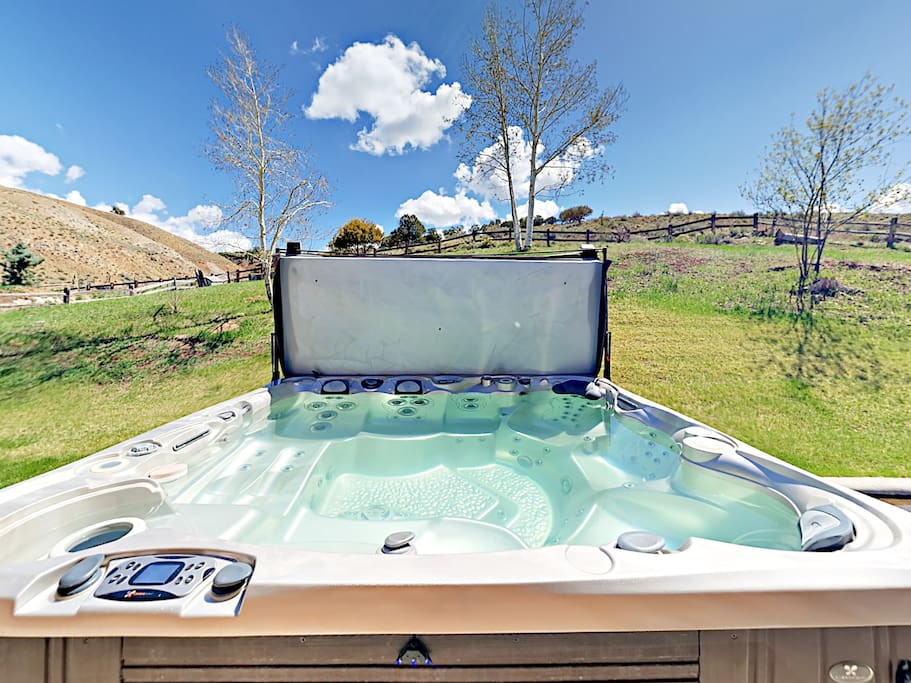 Soak in the private hot tub and take in views of the property.
