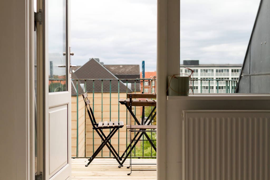 The balcony - can easily fit 6 people. And it is even possible to BBQ there as it is a roof top balcony (5th floor)