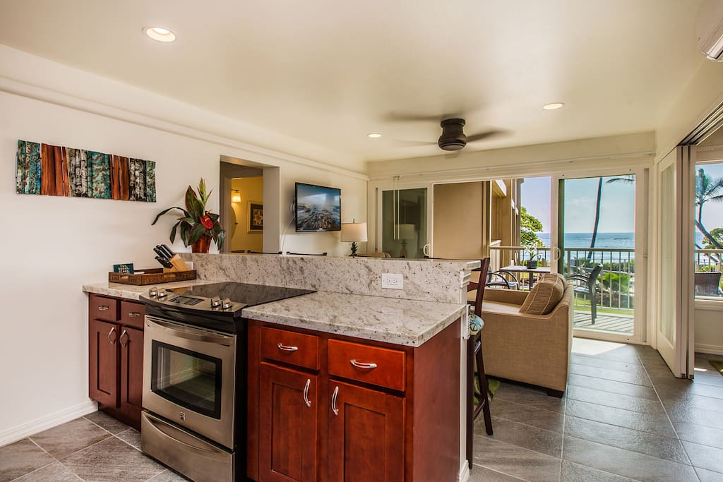 Granite Kitchen, Stainless Appliances and Breakfast Bar