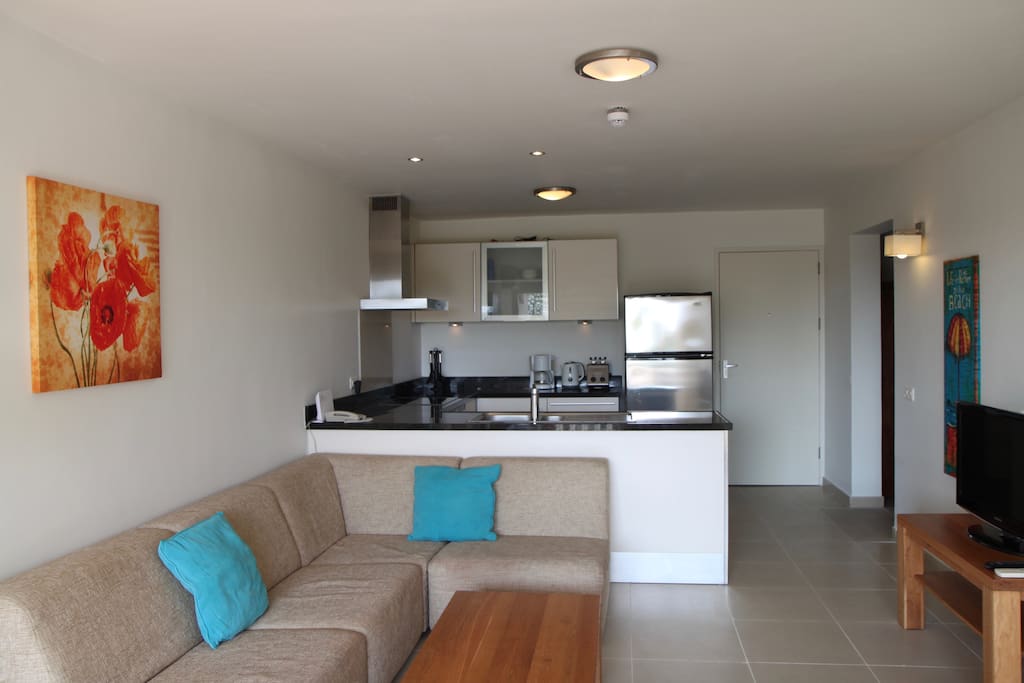 The living room and kitchen