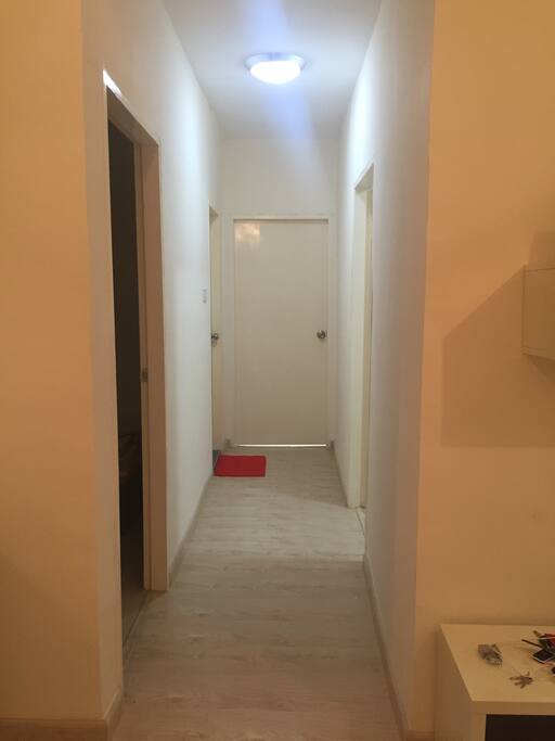 Hallway from the living room the bedrooms.