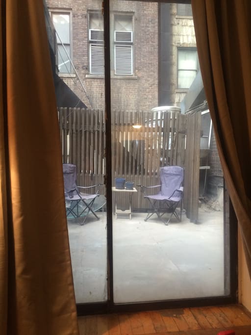 Personal patio, you can see the reflection of the Empire State Building from the large glass building above
