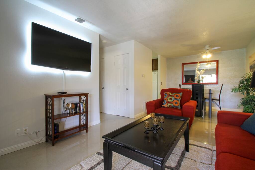 In the living room, we have a flat screen TV, Bluray player, basic cable with free on-demand movies, and free Netflix. Some magazines, books, and DVDs from our collection to enjoy as well