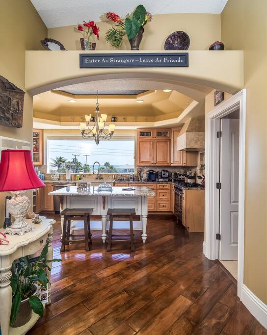 Chef's kitchen with kitchen island overlooking Atlantic ocean