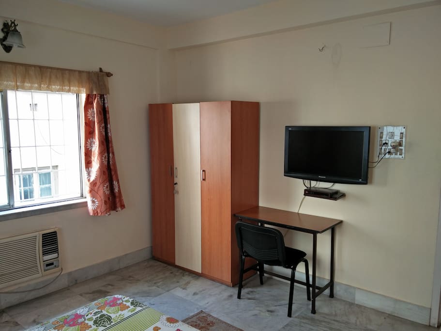 Room 1 (AC, TV, Study table + Chair & Wardrobe)