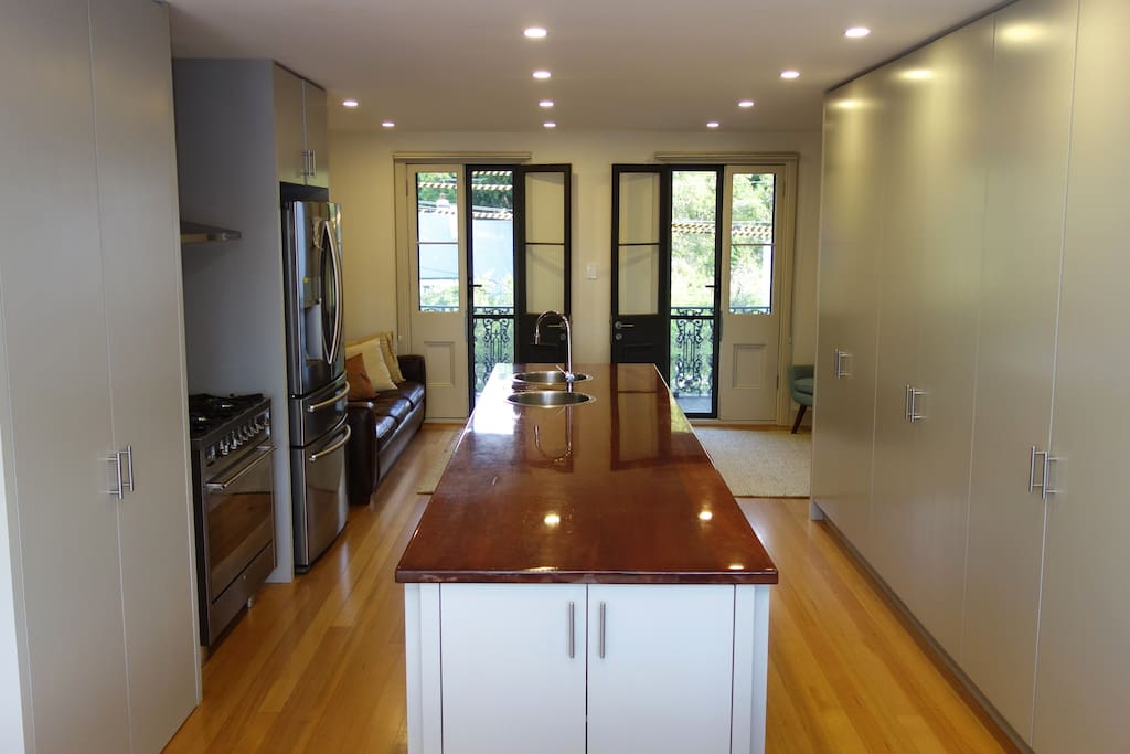 Kitchen area with open plan entertaining space.