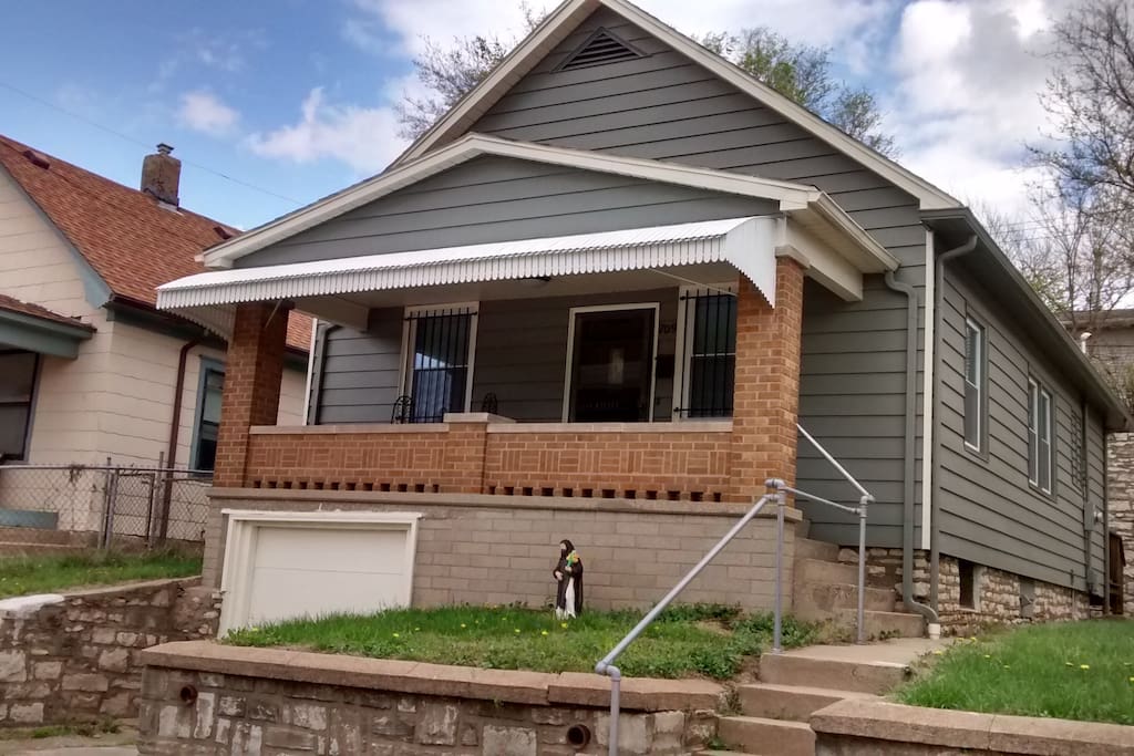 The vacation home features a welcoming front porch for enjoying the town view and people watching, as well as off street parking.