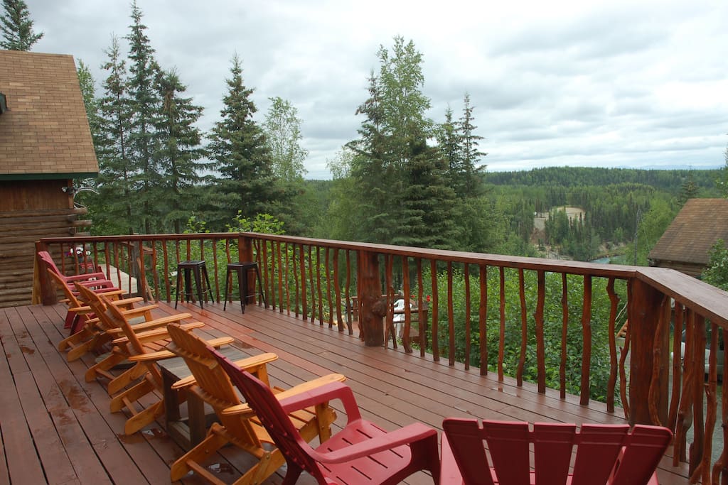Harmony Lodge deck seating for 8 with view of Kenai River and Kenai Mountains