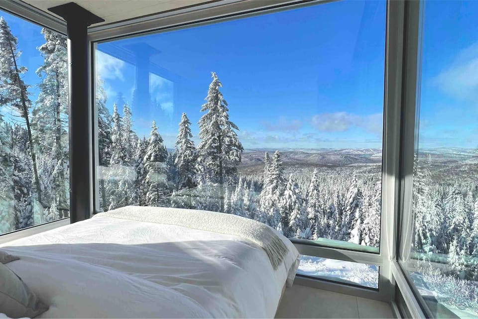 A glass tiny house on a mountaintop near Quebec City, Lac-Beauport, Quebec, Canada, photo 7 of 10