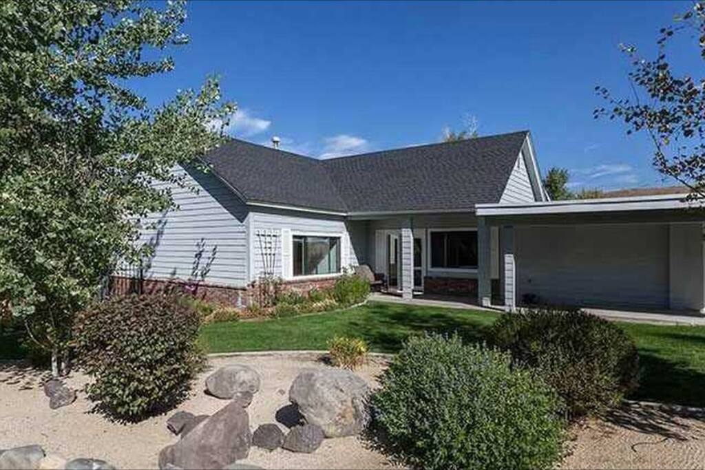 With the house located at the end of the street, a walking bridge awaits your river crossing.