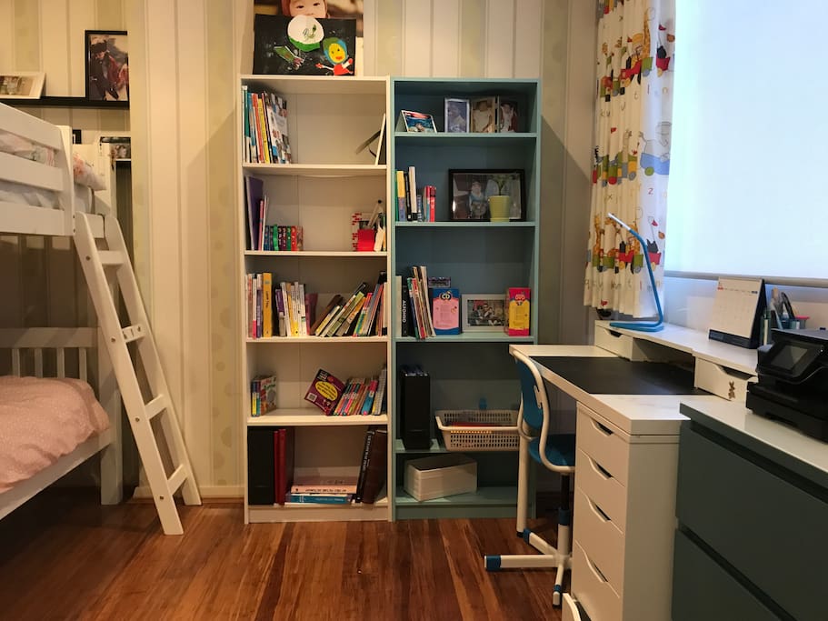 Study nook equipped with desk, printer and wardrobe space