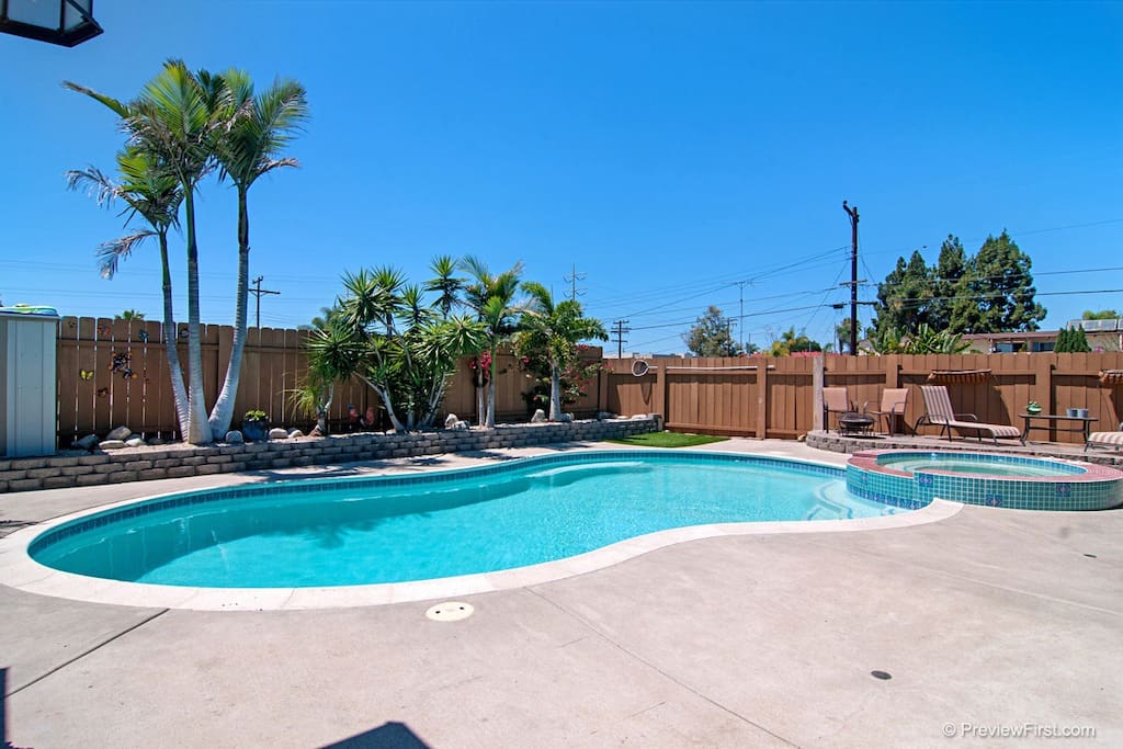 Nice size Backyard with Salt Water pool and jacuzzi. Solar heated warm pool, electric spa heats up quickly & all controlled via smart phone.