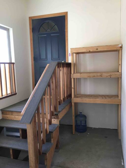 Apartment indoor entry. Can be used for storage of sports equipment.
