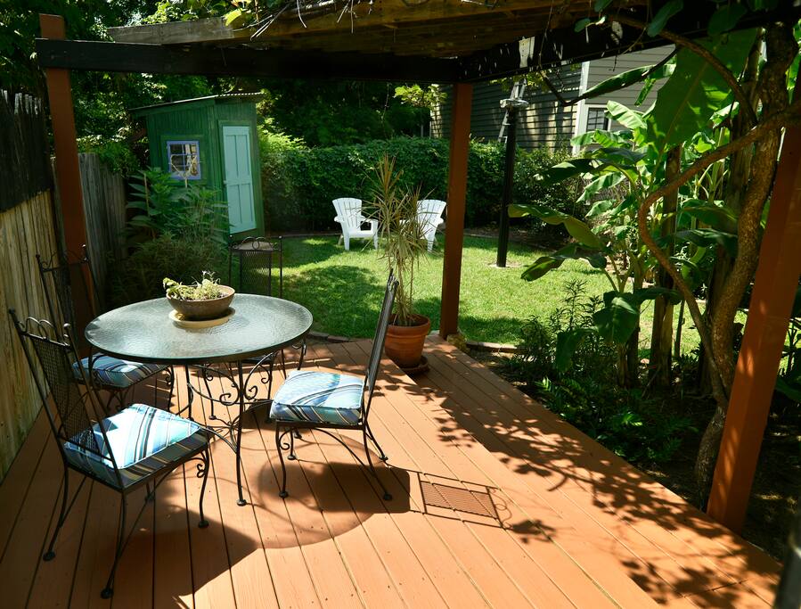 Back garden is private and verdant.