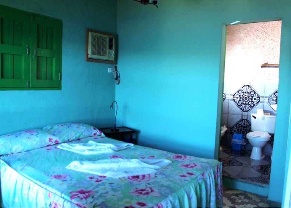 Bedroom with double bed and private bathroom