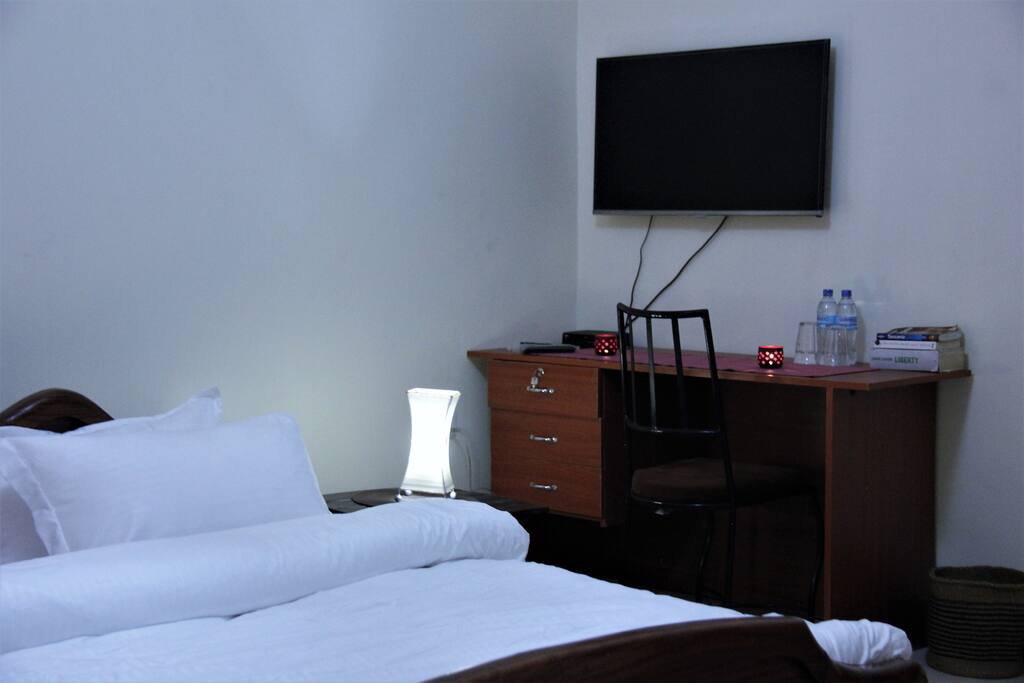 A Family Room with Private Bathroom and Balcony