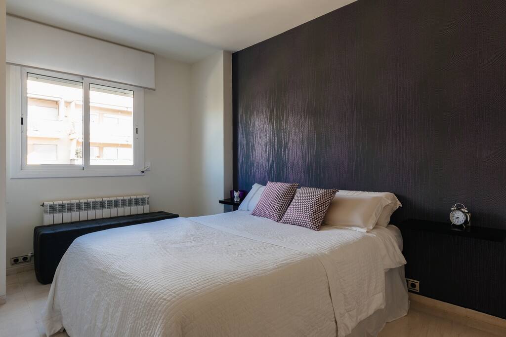 Double bed, blackout blinds and large wardrobe.