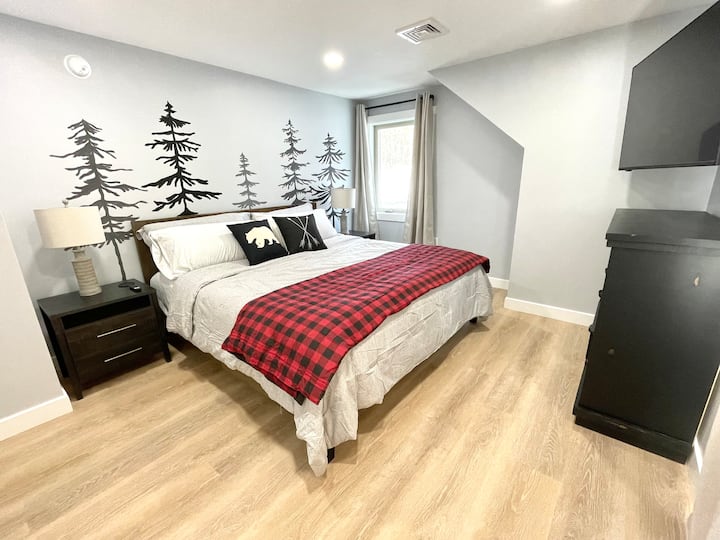 Another king bed can be found in the master bedroom. This is a spacious room with space for a pack-n-play, which we provide as well.