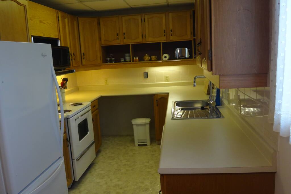 Kitchen with Fridge, stove, dishwasher, microwave