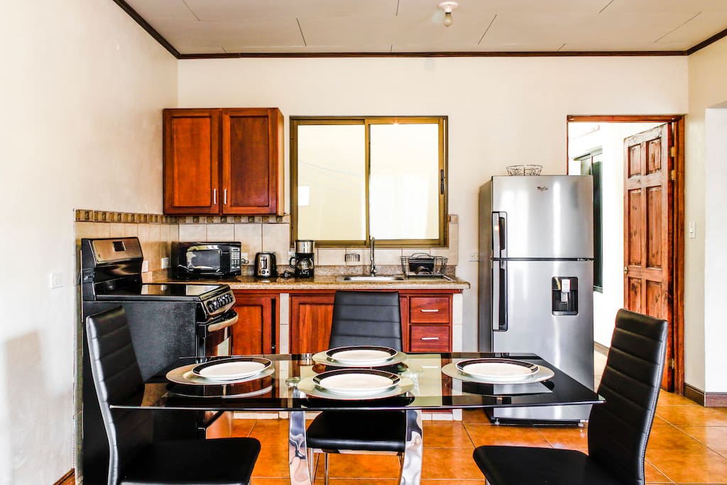 Fully functional kitchen and dining area.