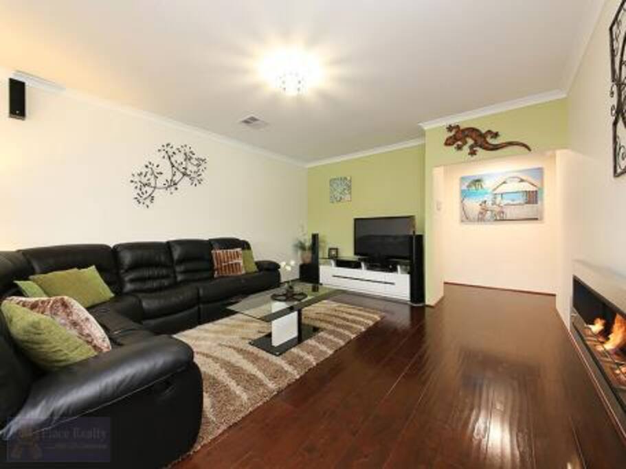 Living Area - PlayStation 3 + Games, Recliner Chairs, TV, Surround Sound, Ethanol Fire