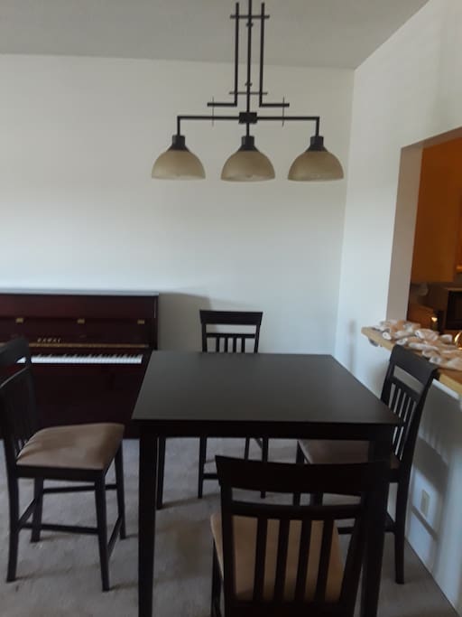 Dining Room: Dining Table Set, A Piano & Lights ....