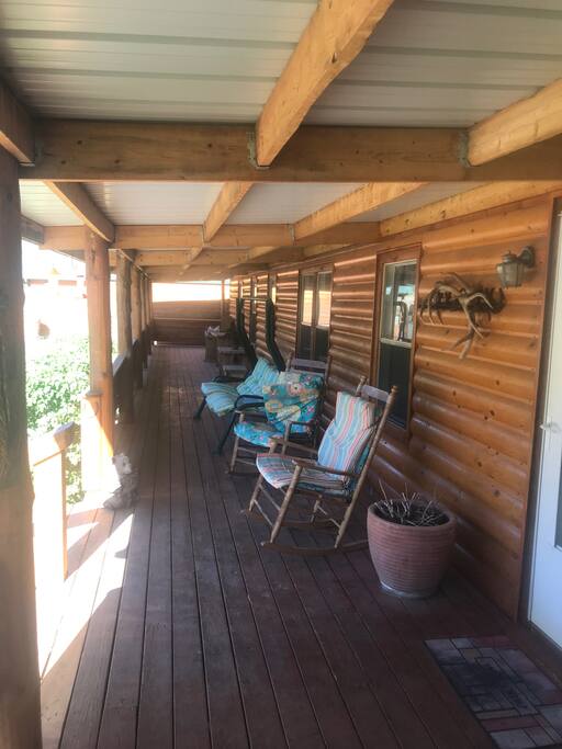 Porch all the way around the cabin. Plenty of sitting area to enjoy the views and wildlife