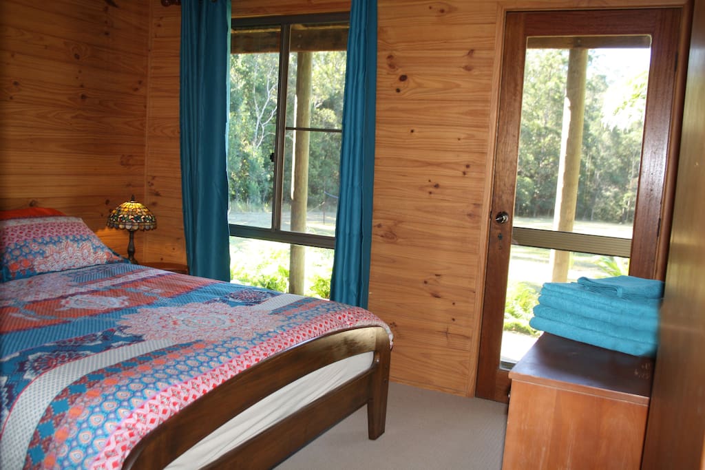Master queen bedroom with deck access