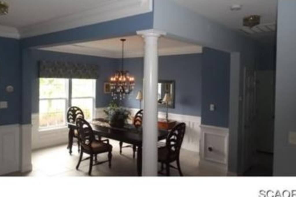Separate dining room sits 8!