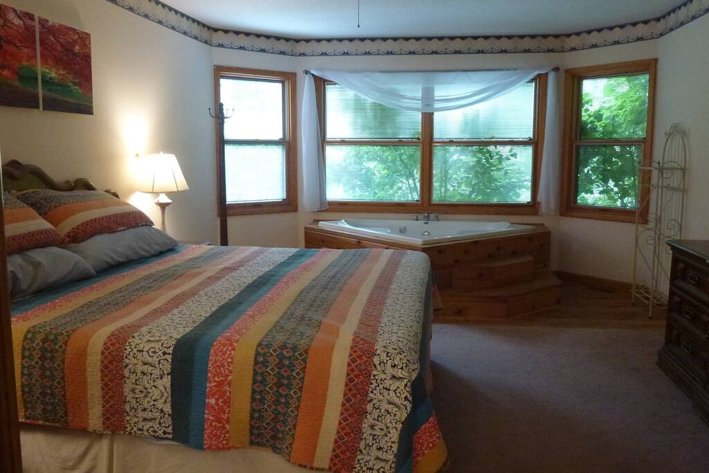 Master bed with Jacuzzi tub