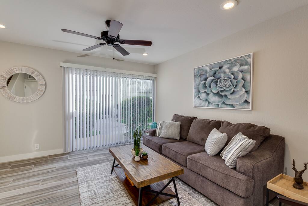 Sliding Glass door in living room for fresh AZ air. Queen pull out couch.